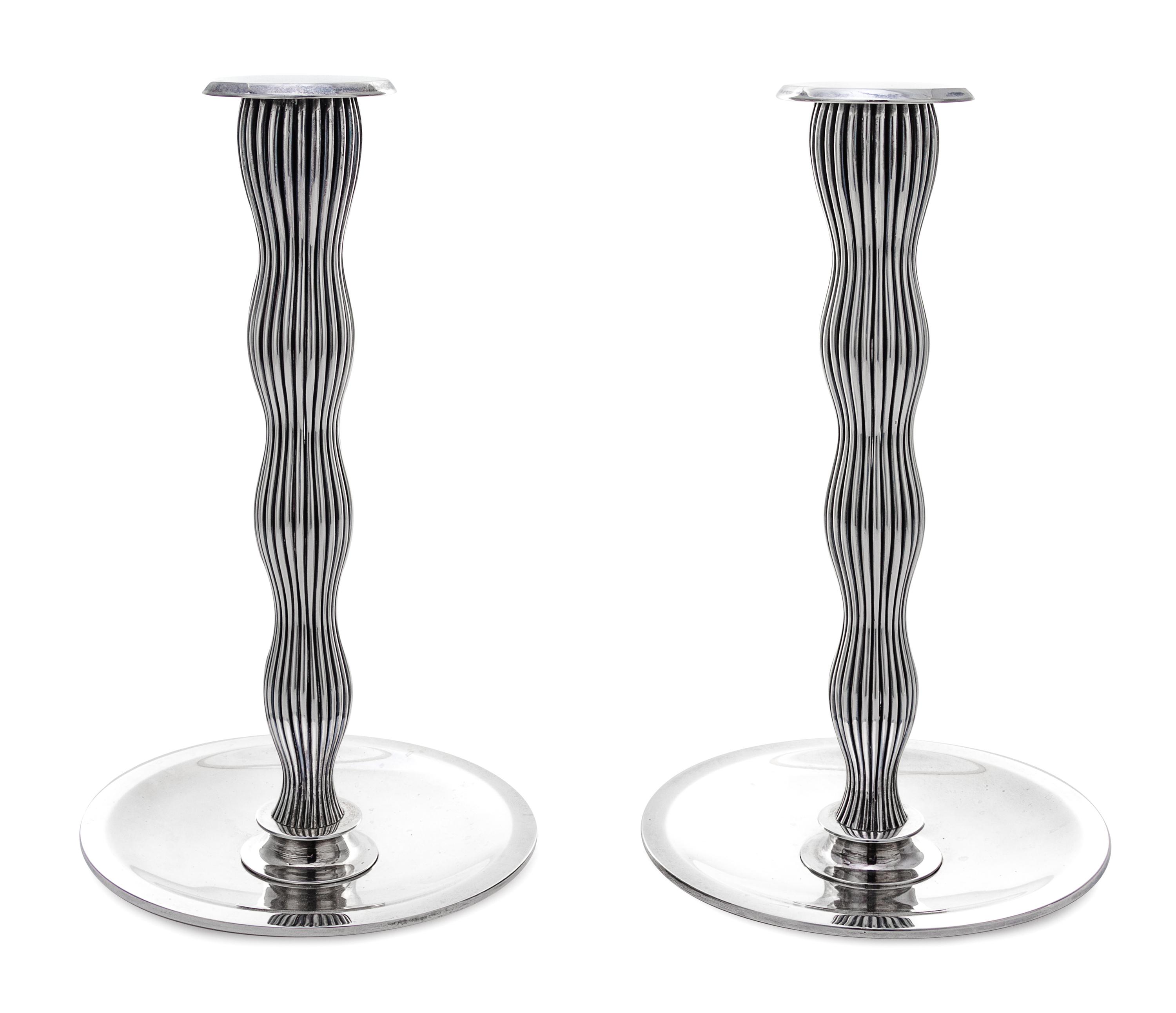A Pair of Danish Silver Candlesticks, Designed by Svend Weihrauch for Frantz Hingelberg, Aarhus, Mid-20th Century, of tapered and undul
