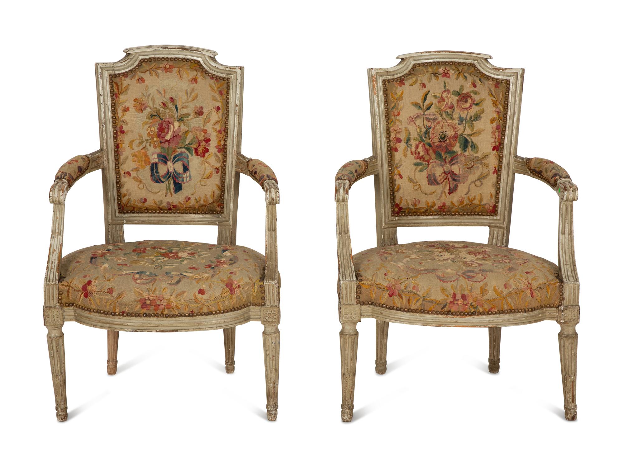 A Pair of Louis XVI Painted Fauteuils