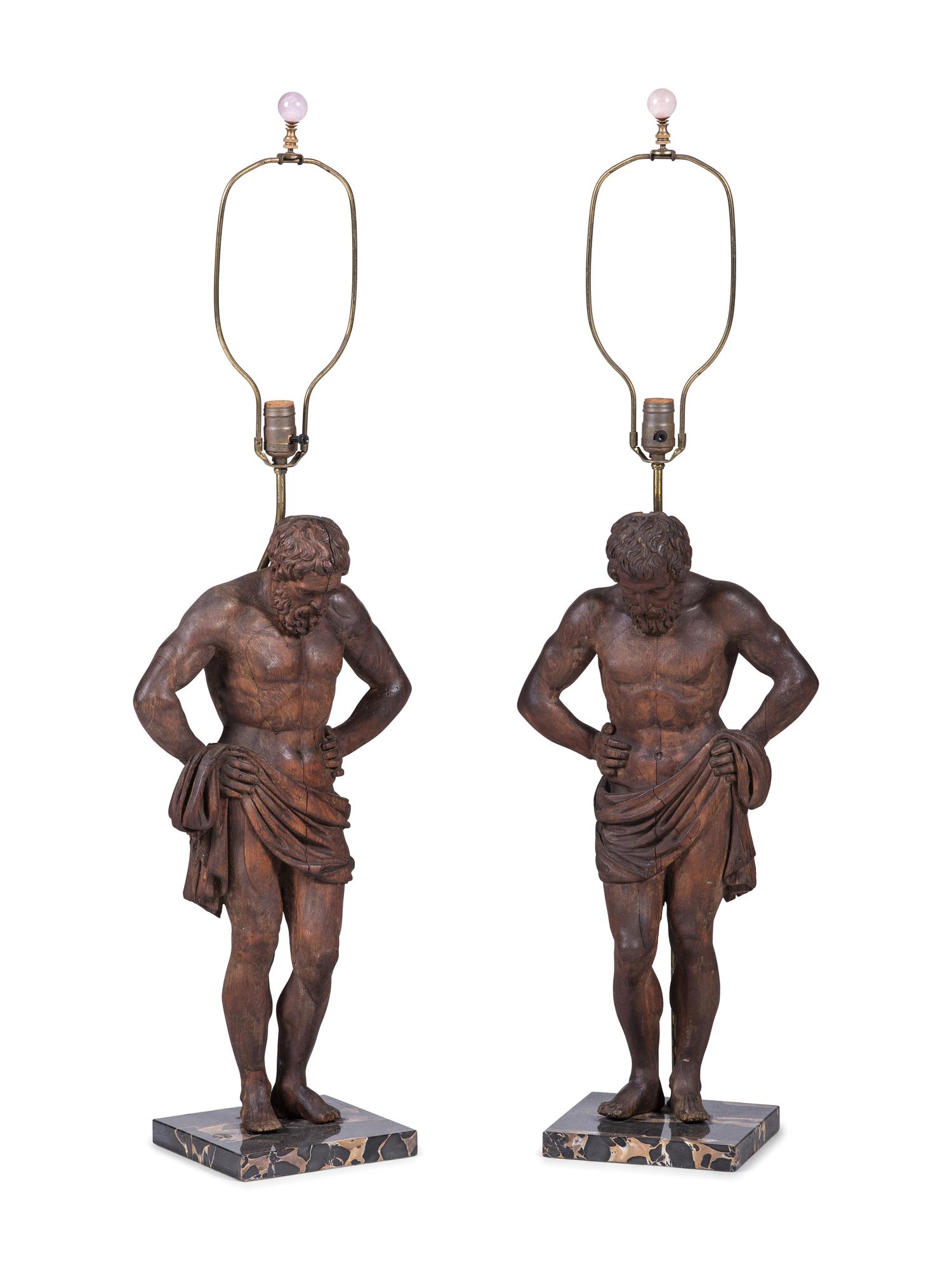 A Pair of Carved Pine Figures of Classical Men
