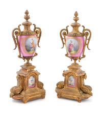 A Pair of Sèvres Style Gilt Metal Mounted Painted Porcelain Ornaments