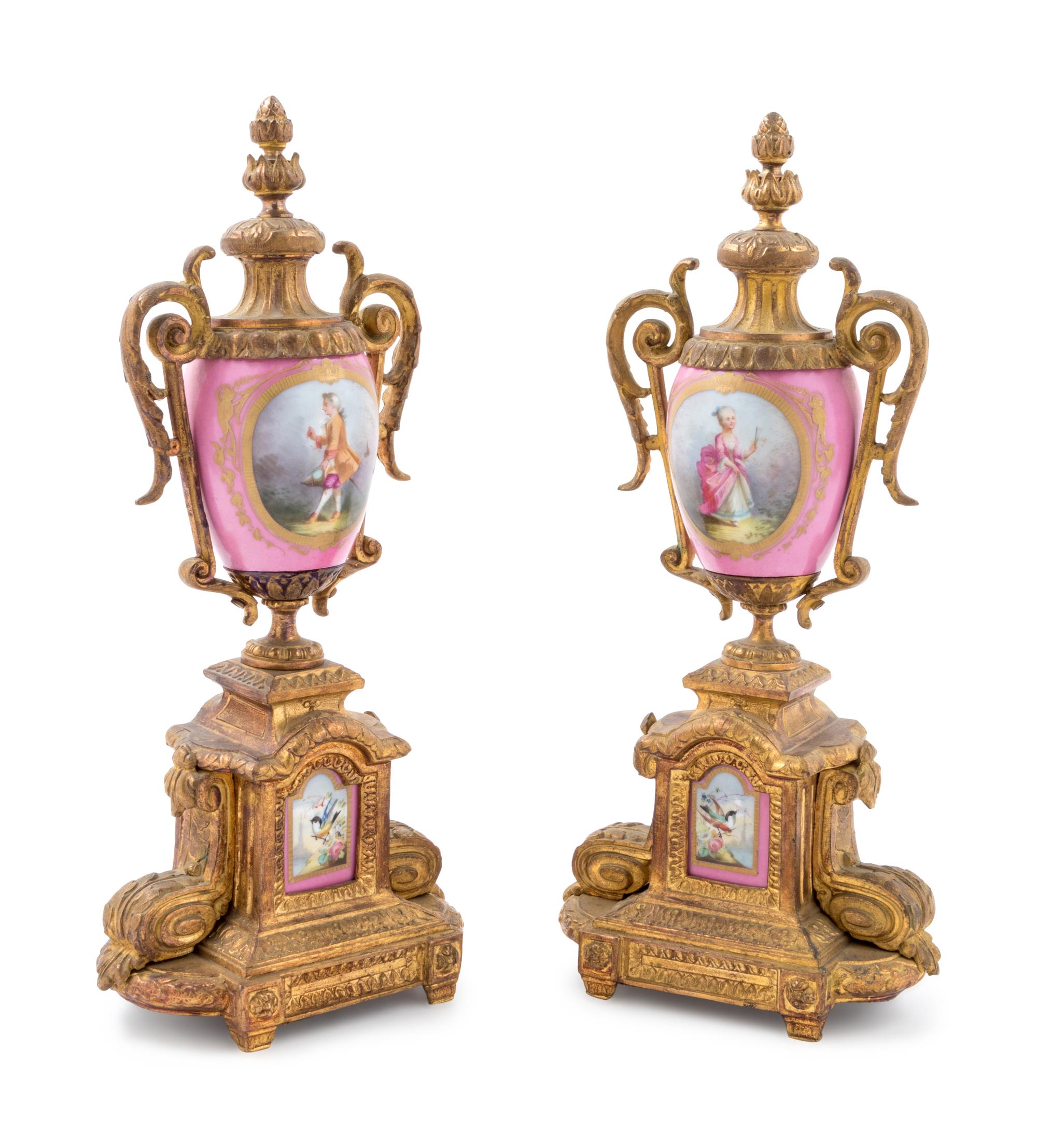A Pair of Sèvres Style Gilt Metal Mounted Painted Porcelain Ornaments