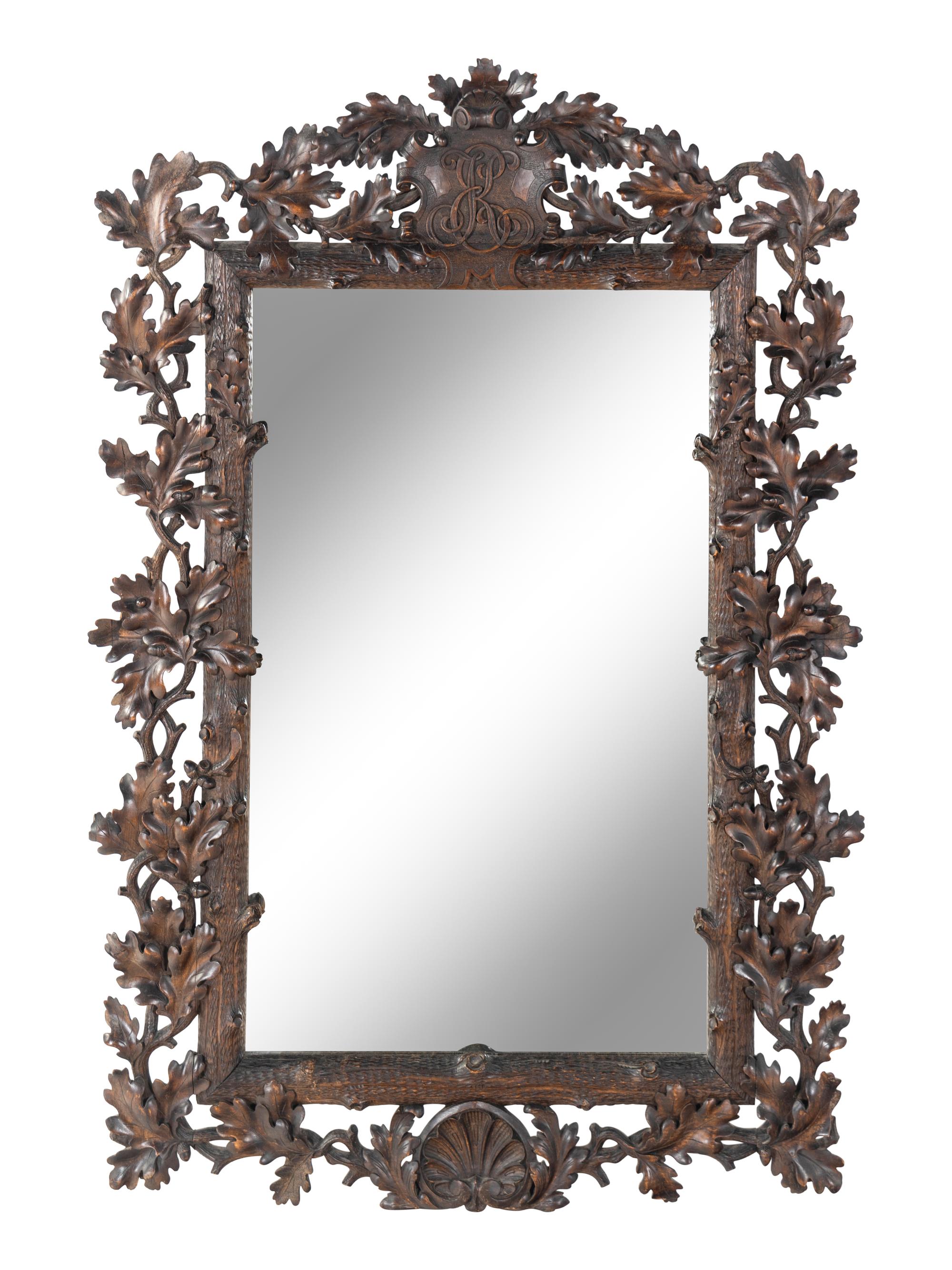 A Black Forest Carved Mirror