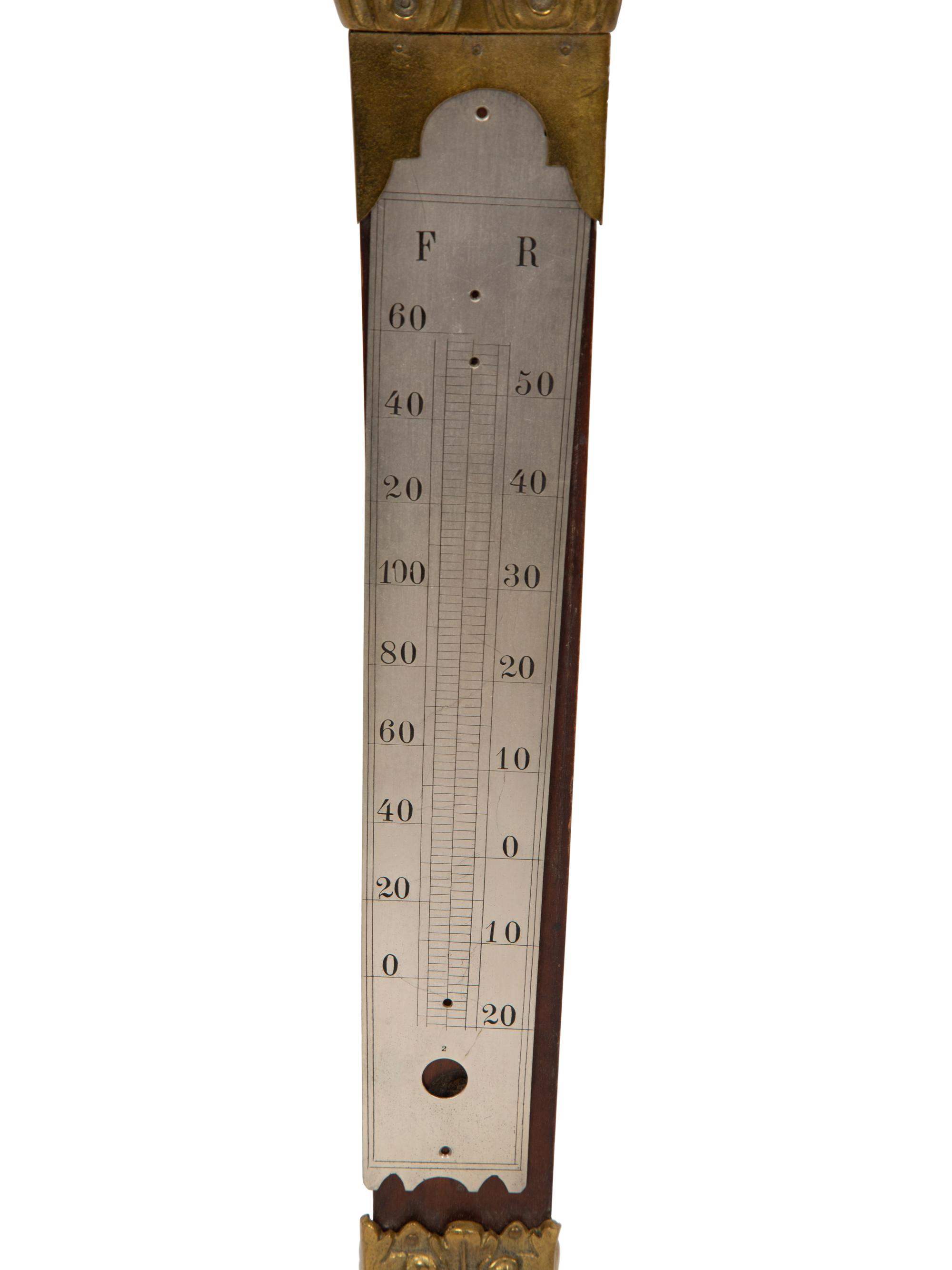 A Continental Carved Wood and Gilt Bronze Thermometer