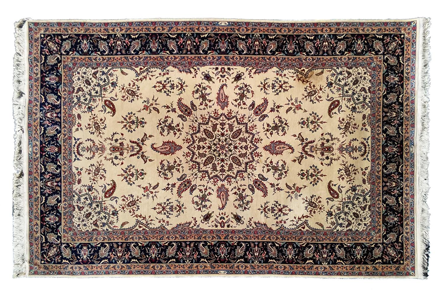 A Wool and Persian Design Rug 10 feet x 5 feet 9 inches. — 20TH CENTURY