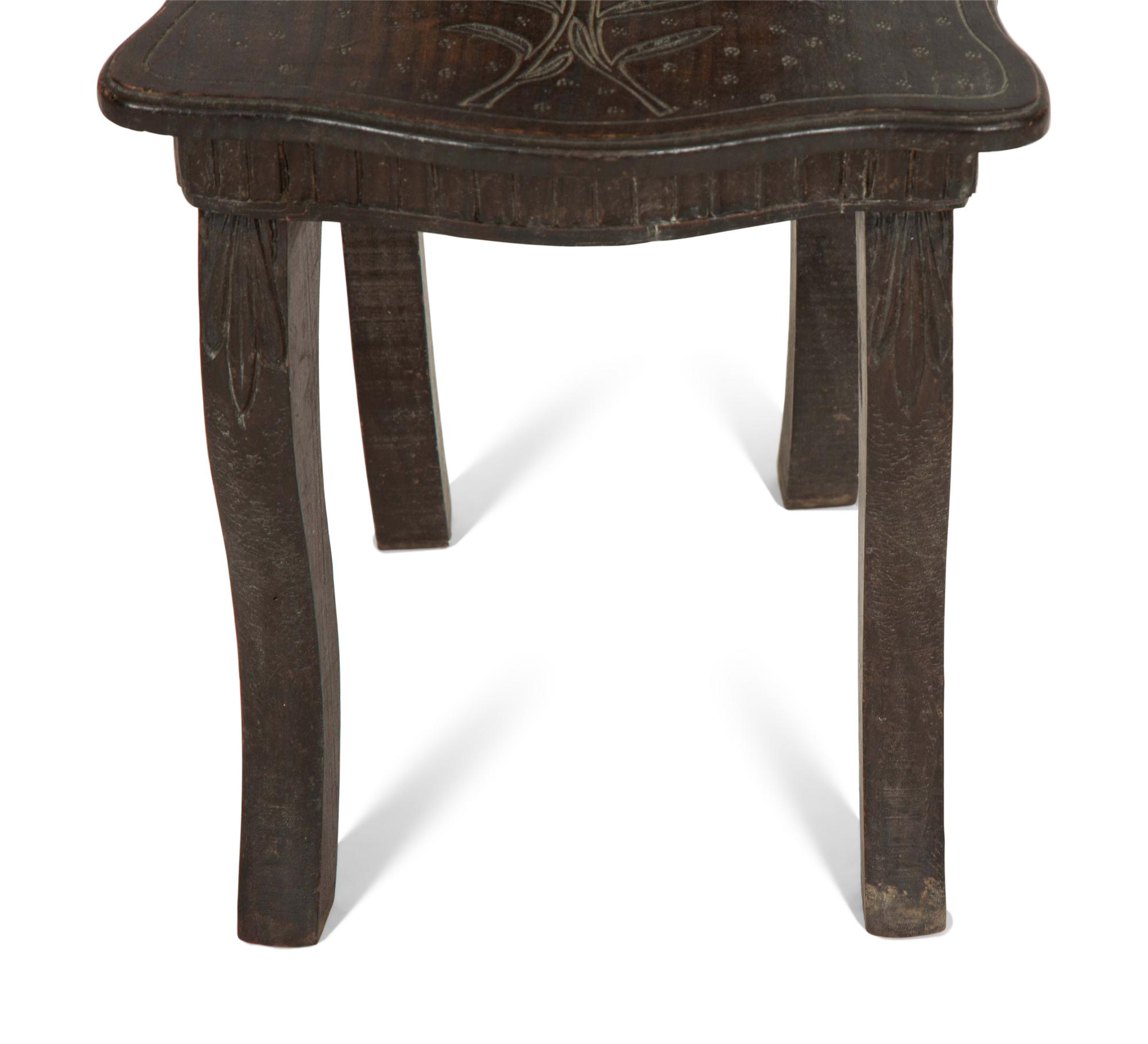 A Black Forest Carved Wood Child's Chair