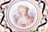 A Set of Twelve Sèvres Style Porcelain Plates Depicting Courtiers
