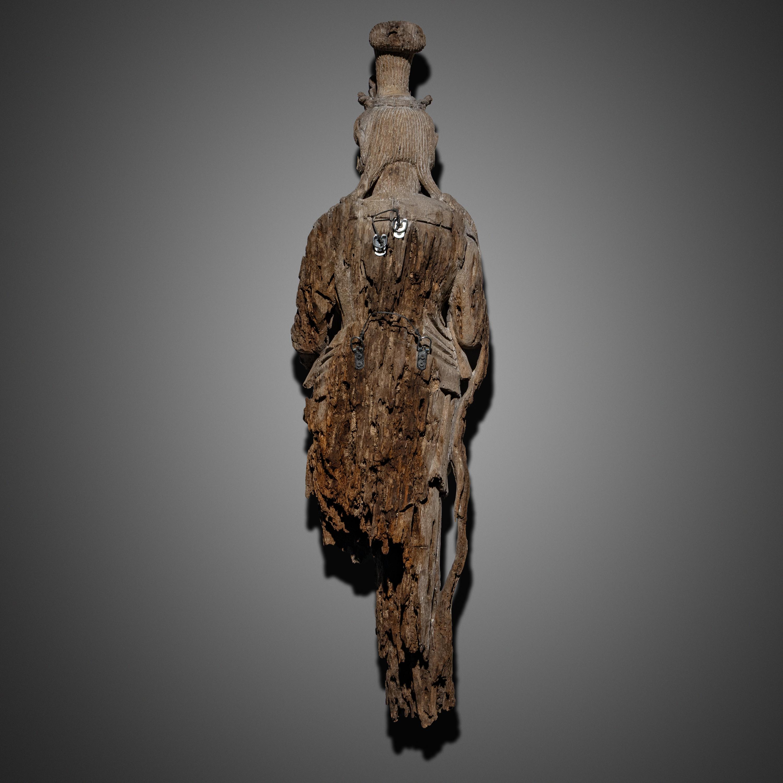 A Chinese Wood Carving of Guanyin Bodhisattva, Yuan Dynasty or Later — 元或以後 木雕觀音像