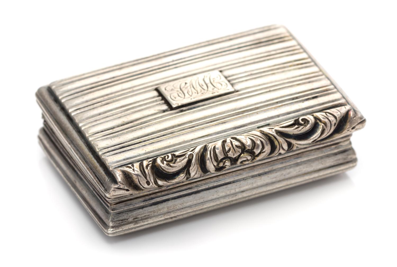 A George IV Silver Vinaigrette, Nathaniel Mills, Birmingham, 1830, having a ribbed case, the lid centered by a monogrammed cartouche, t