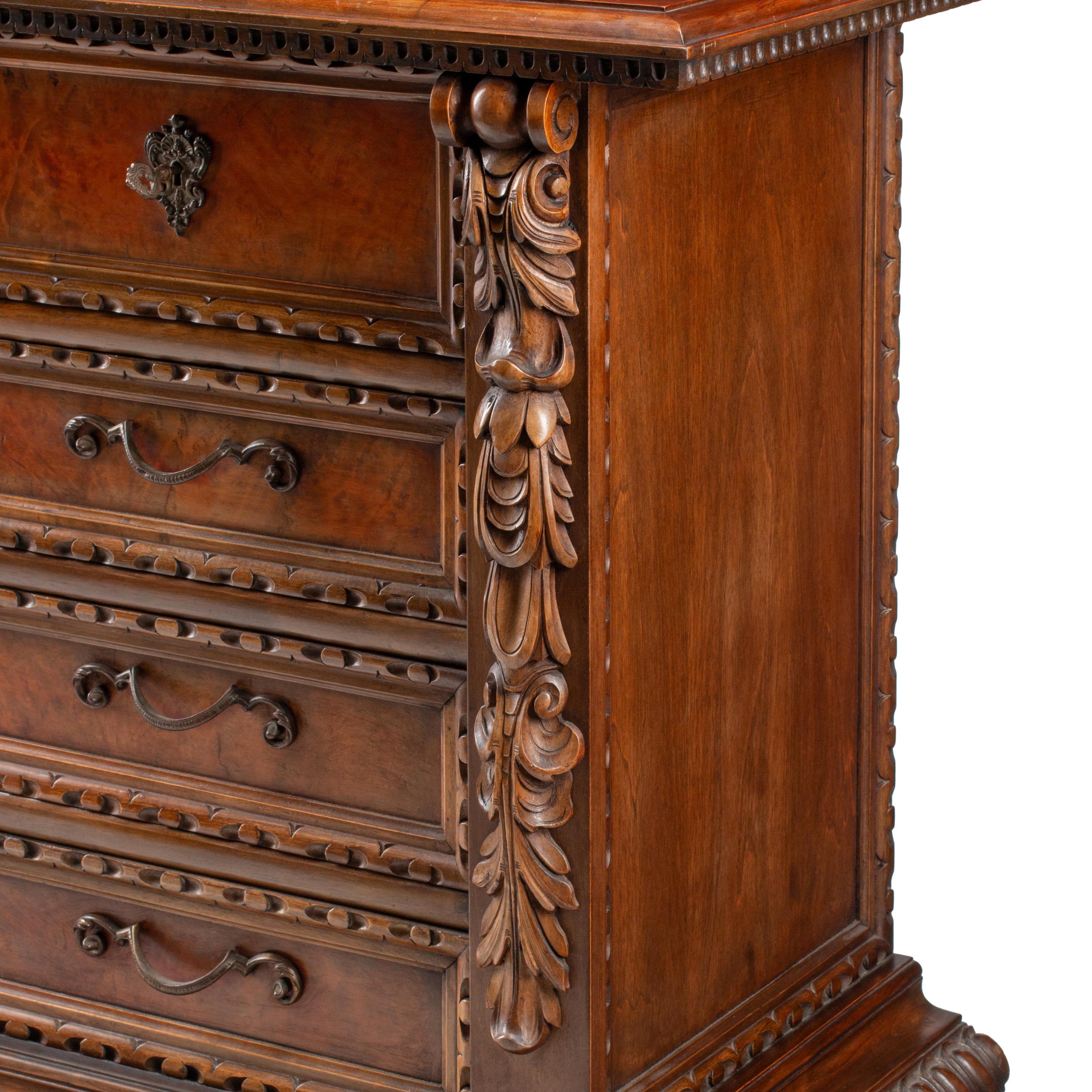 A Spanish Baroque Style Walnut Chest of Drawers