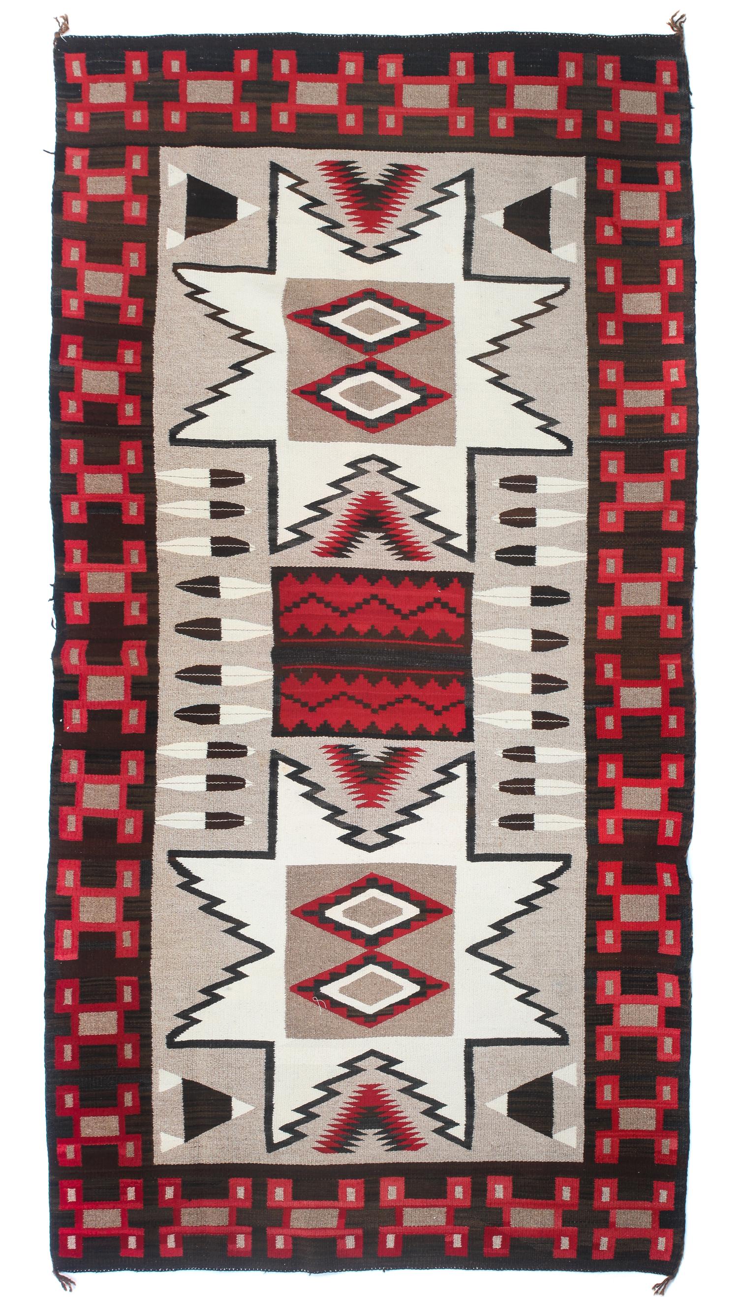 A Navajo Ganado Pictorial Rug 86 x 48 inches.