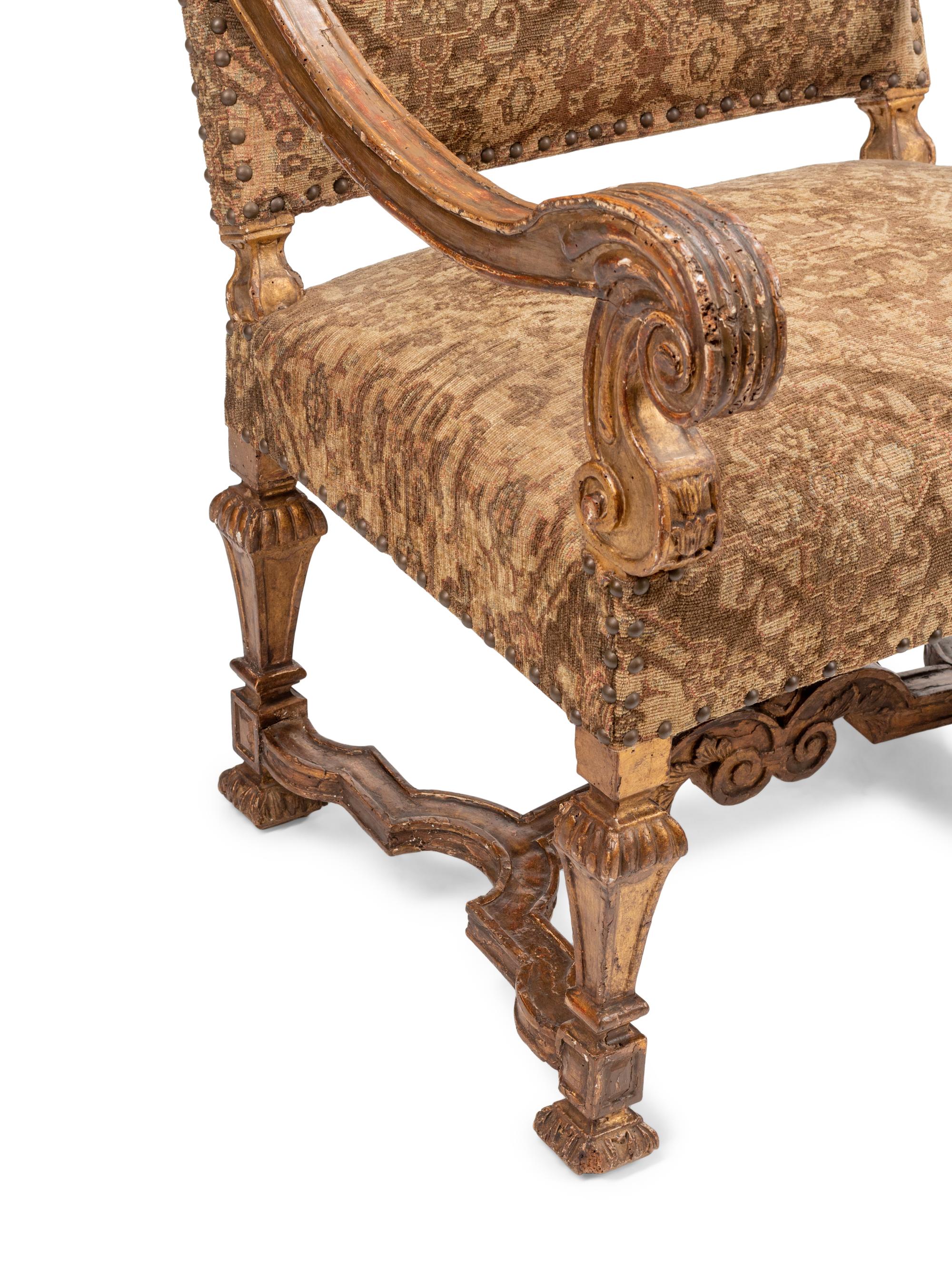 A Pair of Louis XIV Giltwood Armchairs