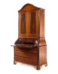A Baltic Neoclassical Parcel Gilt Walnut Secretary