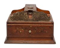 A Monitor Paint Decorated Oak and Cast Iron Coin-Operated Barbershop Cash Register