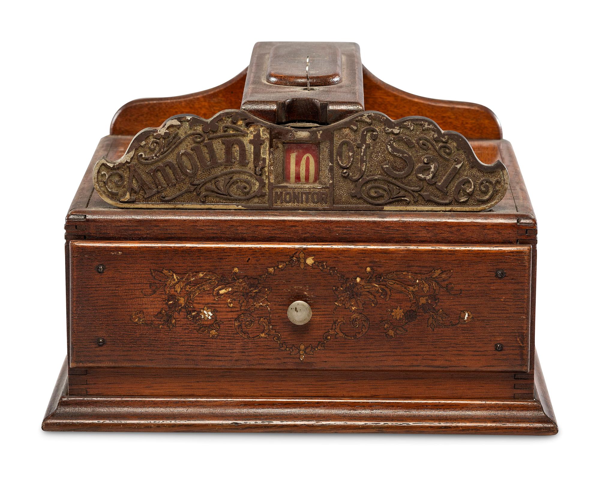 A Monitor Paint Decorated Oak and Cast Iron Coin-Operated Barbershop Cash Register