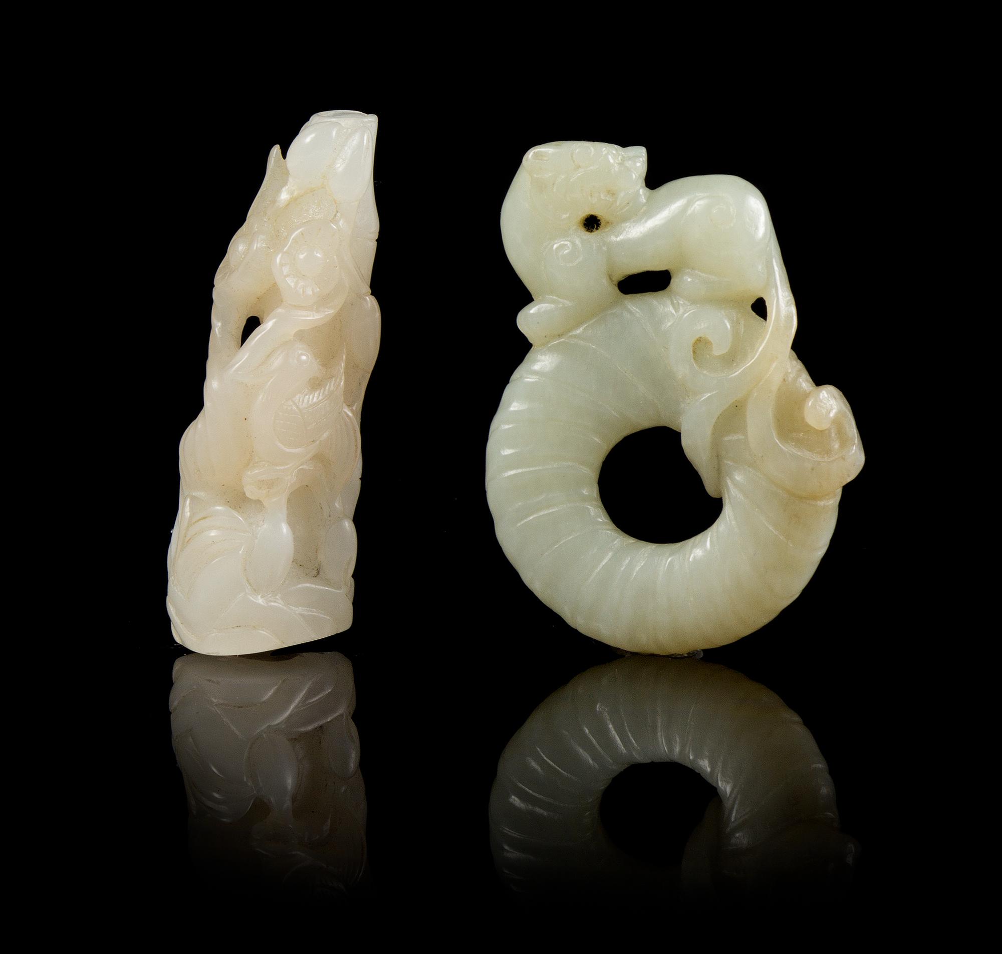 Two Carved Jade Articles Length of longer 2 1/2 inches.