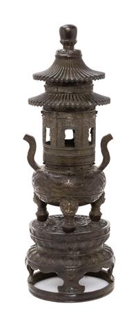 A Chinese Bronze 'Pagoda' Covered Incense Burner Height 19 inches. — 20TH CENTURY