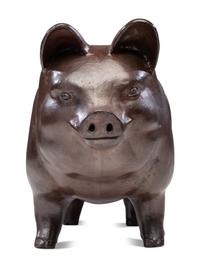A Glazed Sewer Tile Advertising Pig