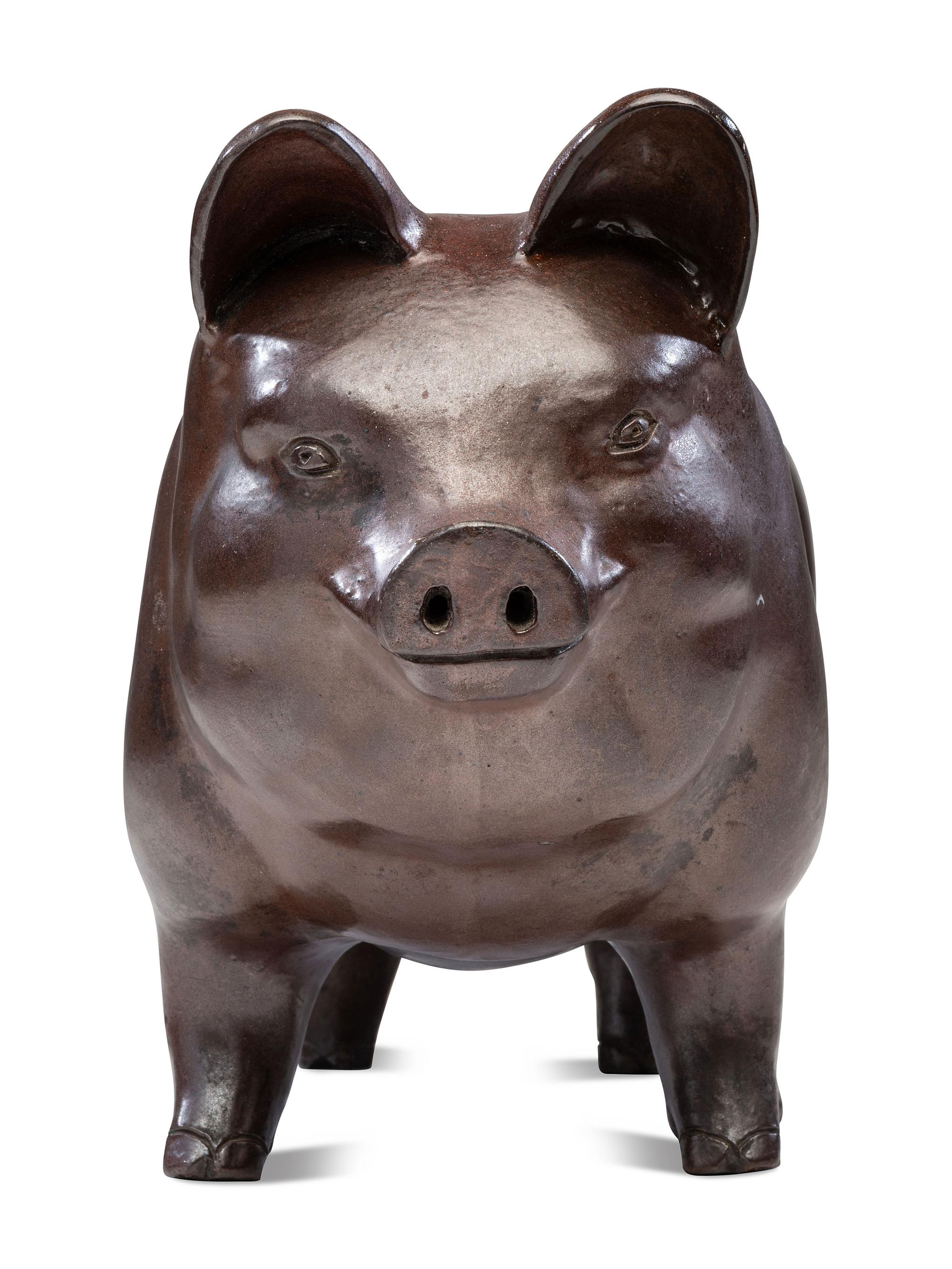 A Glazed Sewer Tile Advertising Pig