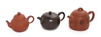 Three Chinese Yixing Pottery Teapots Height of tallest 3 1/2 inches. — 20TH CENTURY