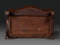 A Chippendale Figured Mahogany Serpentine Chest of Drawers