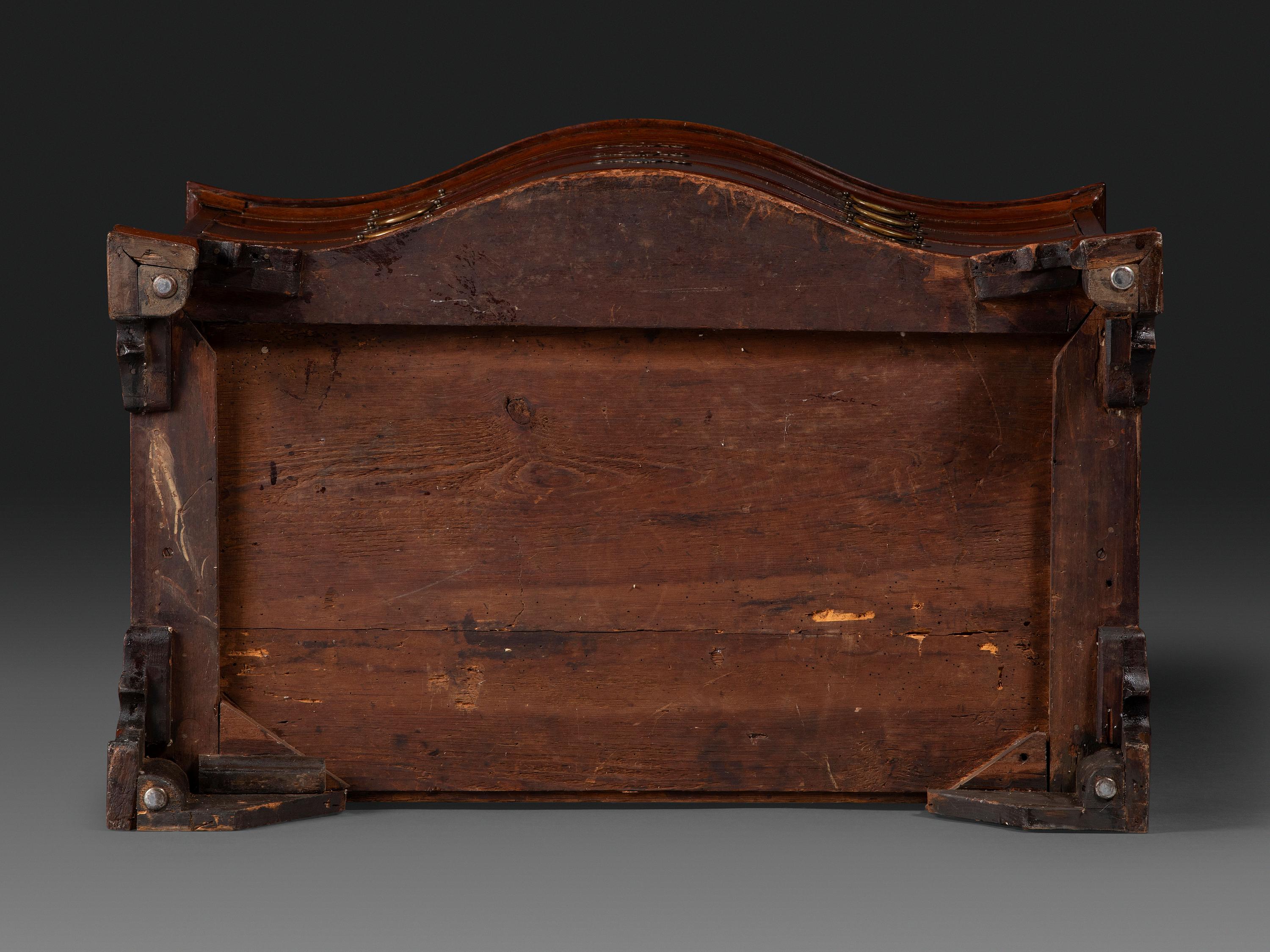 A Chippendale Figured Mahogany Serpentine Chest of Drawers