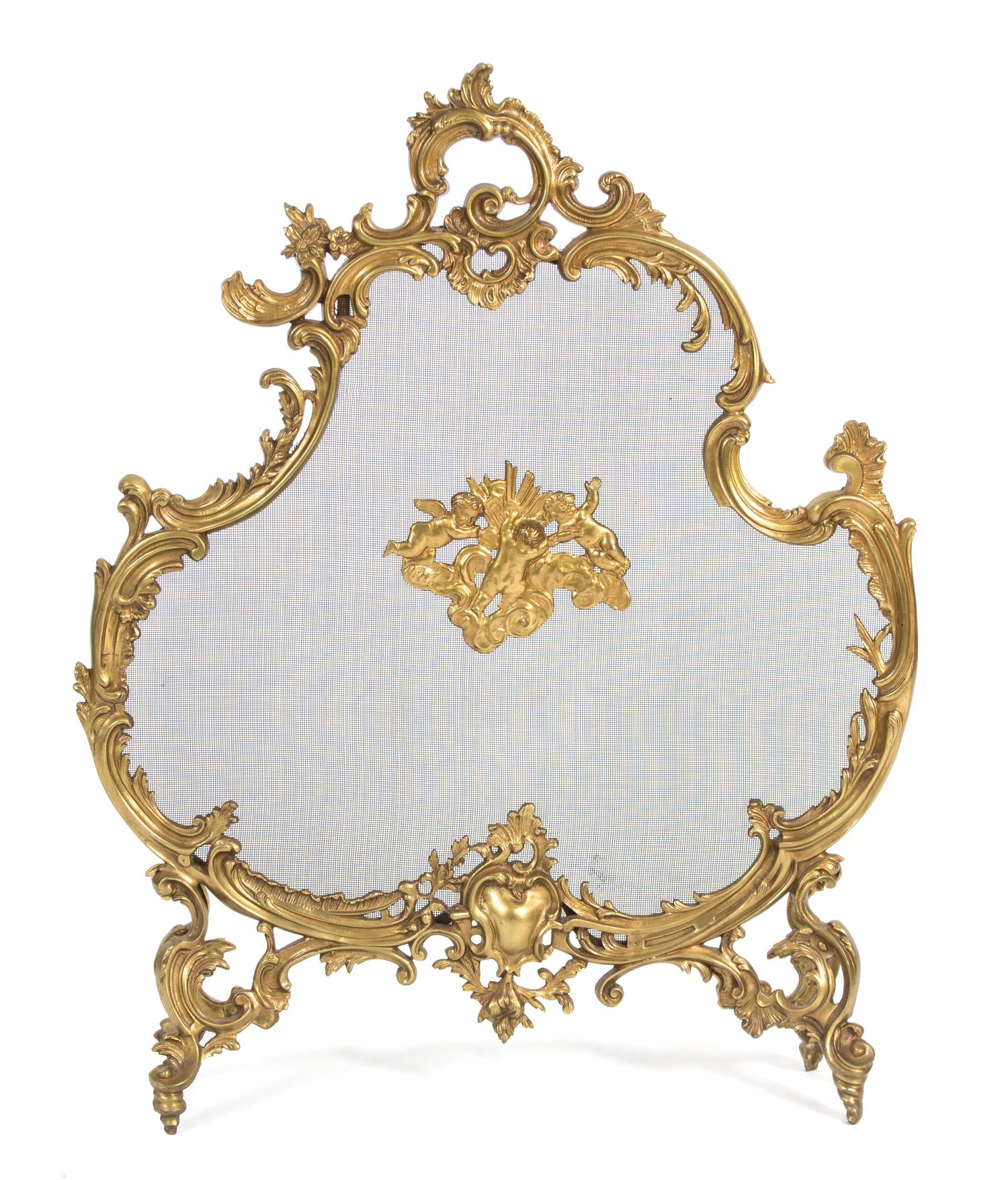 A Louis XV Style Gilt Bronze and Wire Mesh Cartouche-Form Fire Screen Height 33 3/4 x width 26 1/2 inches. — 19TH CENTURY