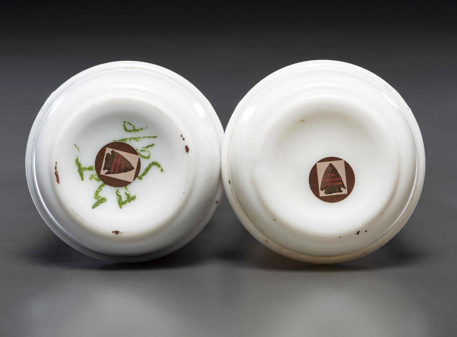 A Pair of Hand Painted Personalized Milk Glass Barber's Bottles