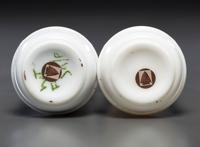 A Pair of Hand Painted Personalized Milk Glass Barber's Bottles