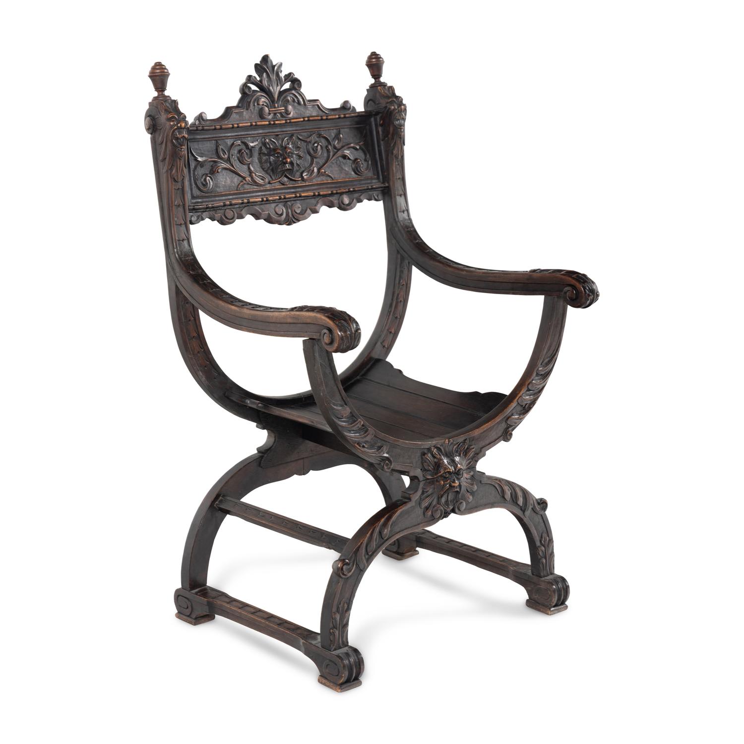 An Italian Renaissance Revival Carved Walnut Savonarola Chair