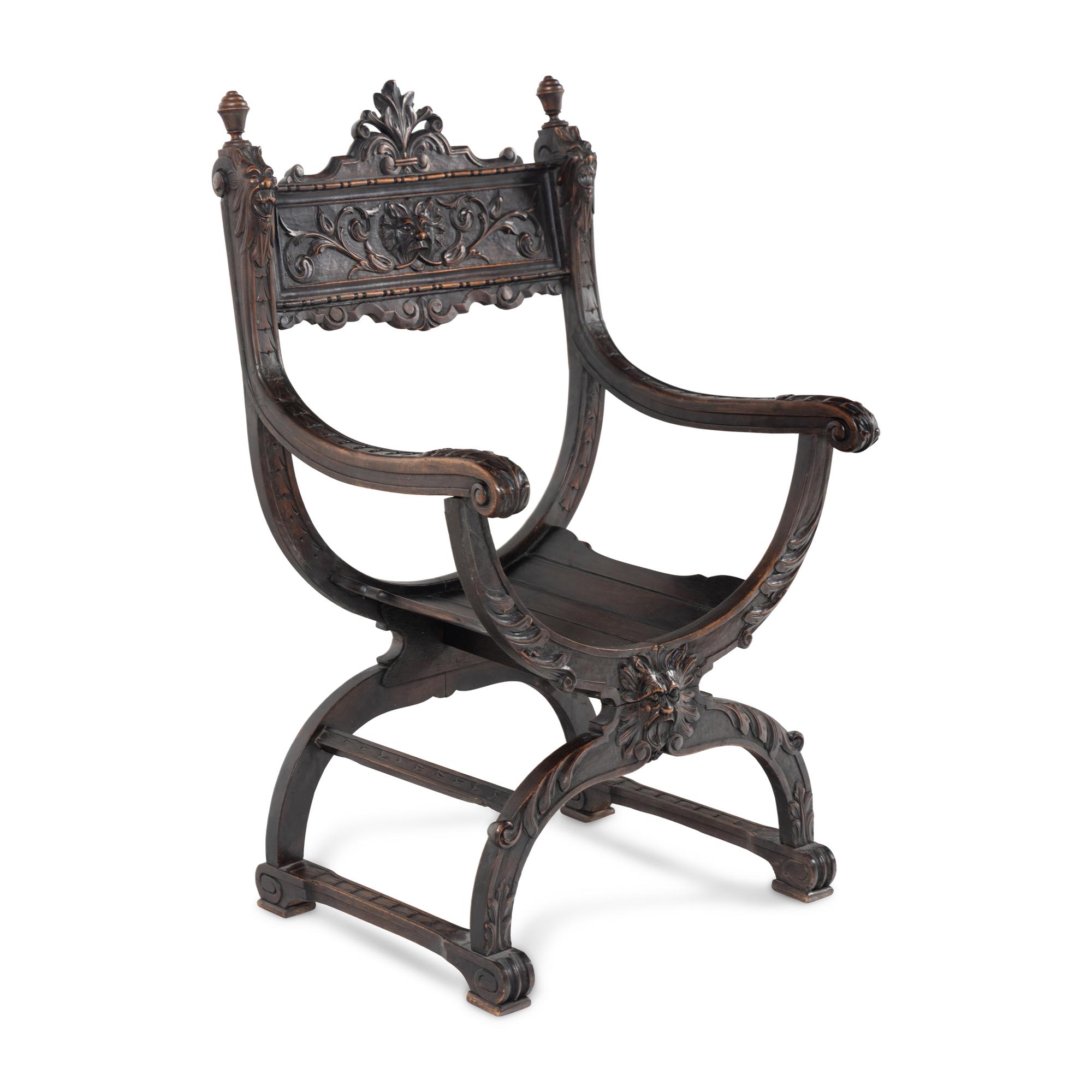 An Italian Renaissance Revival Carved Walnut Savonarola Chair
