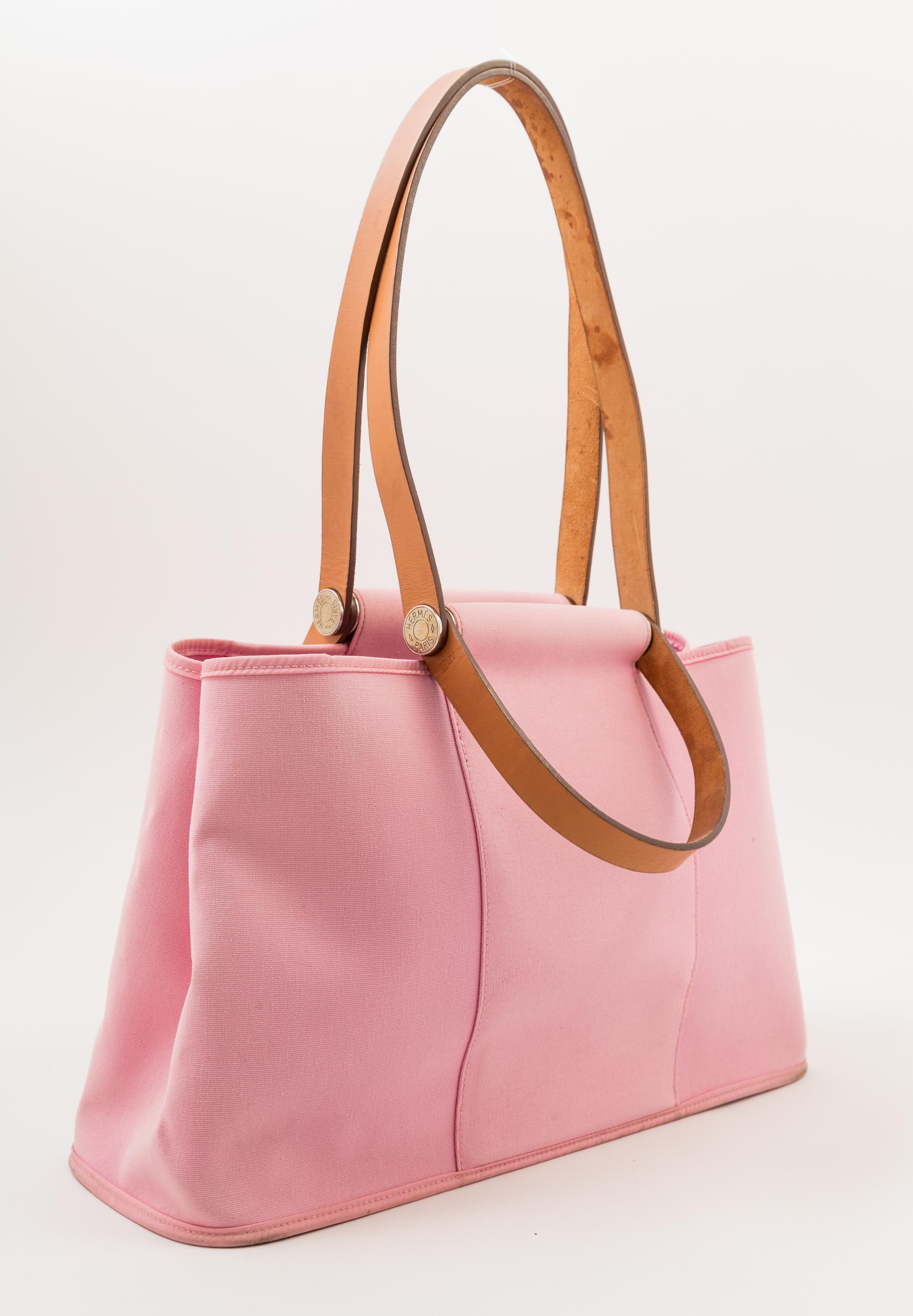 An Hermès Pink Toile Canvas Cabag Tote, 15.5" x 9.25" x 5.75"; Handle drop: 5".