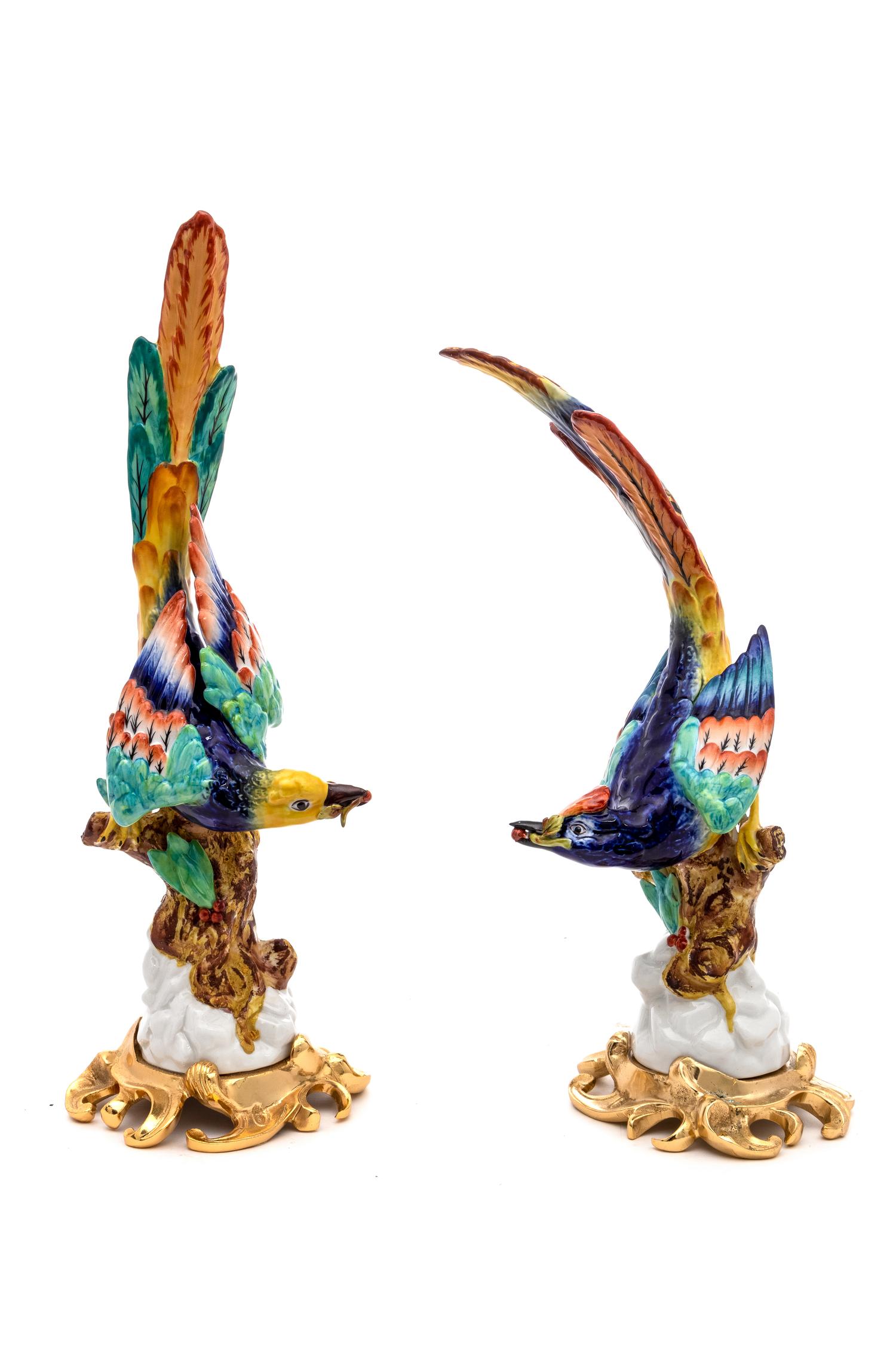A Pair of Sevres Style Porcelain Gilt Metal Mounted Birds