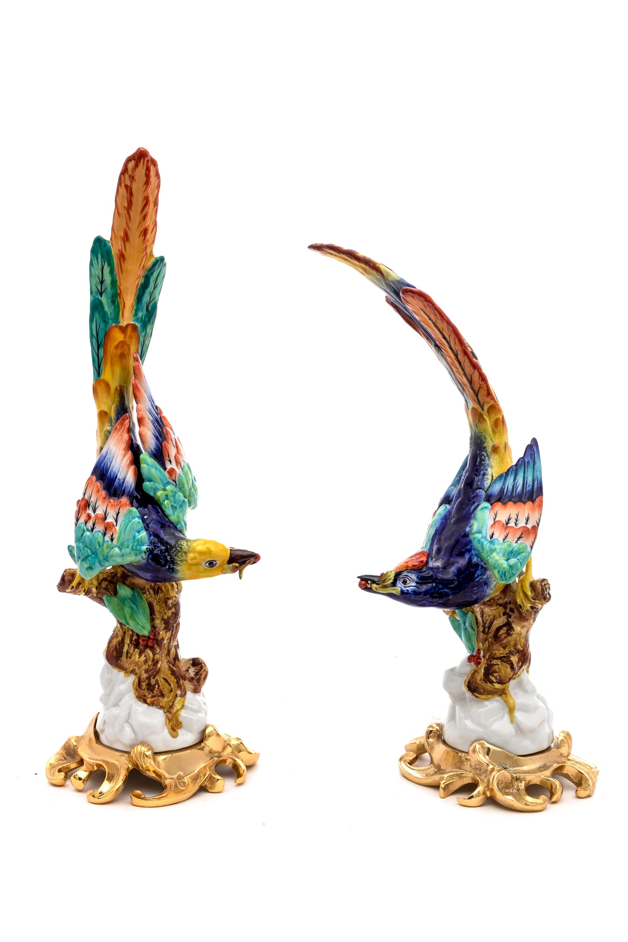 A Pair of Sevres Style Porcelain Gilt Metal Mounted Birds