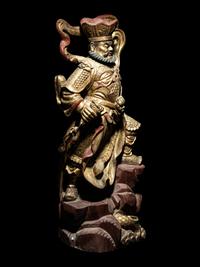 A Set of Four Gilt and Red Lacquered Wood Figures of Guardians