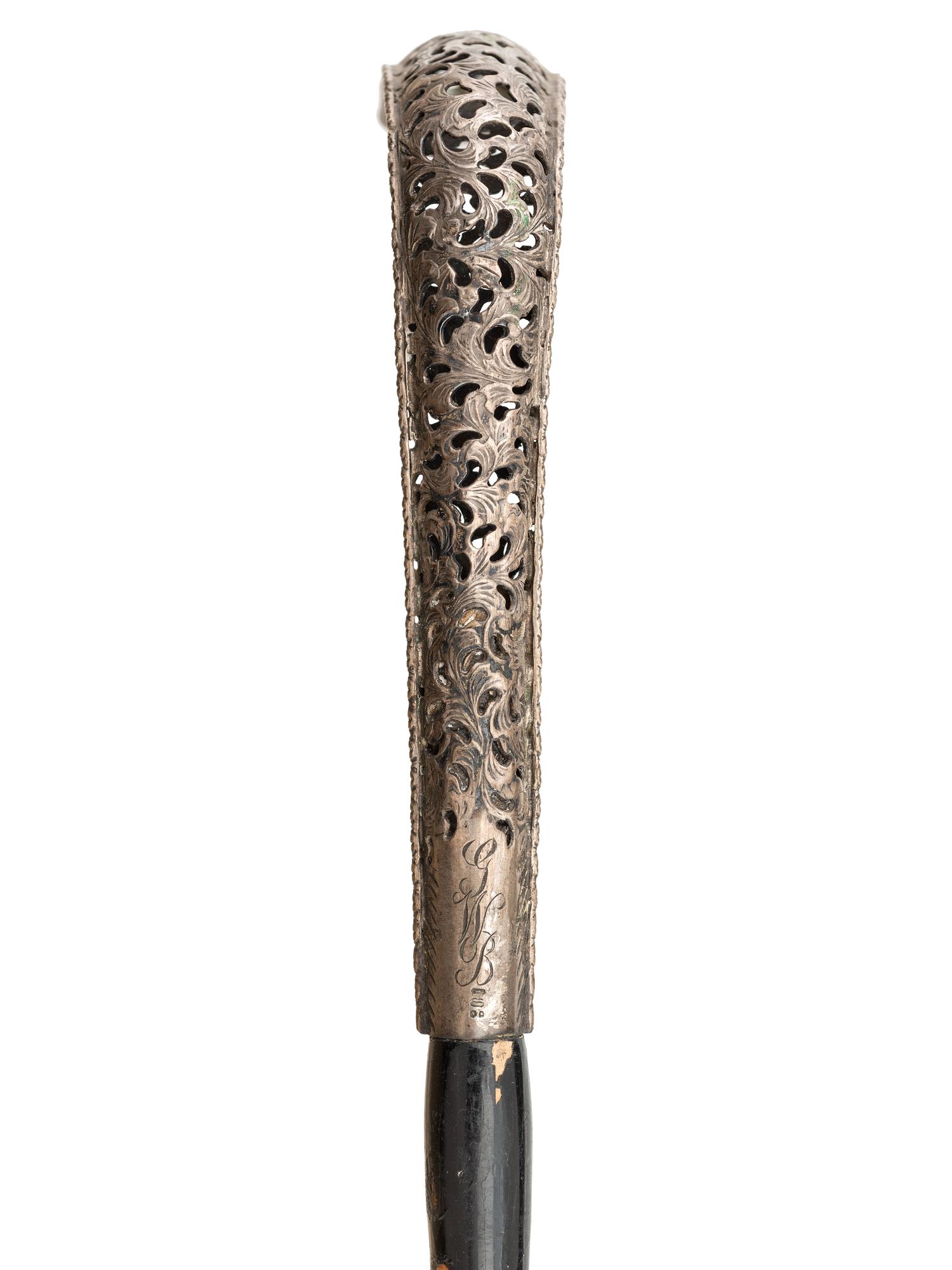 Two Parasols with Decorated Handles
