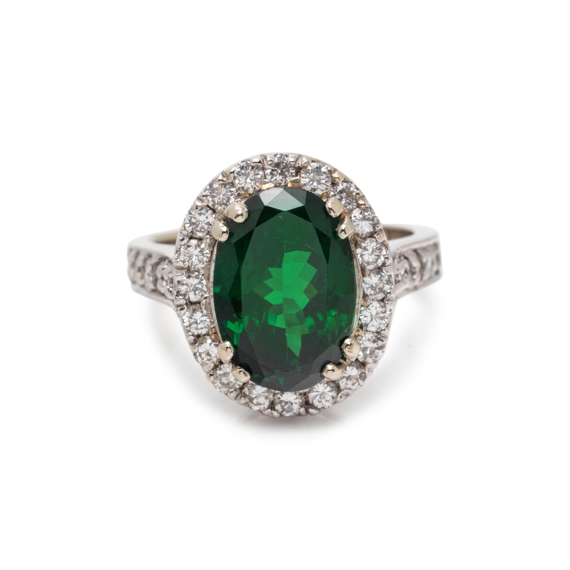 TSAVORITE GARNET AND DIAMOND RING