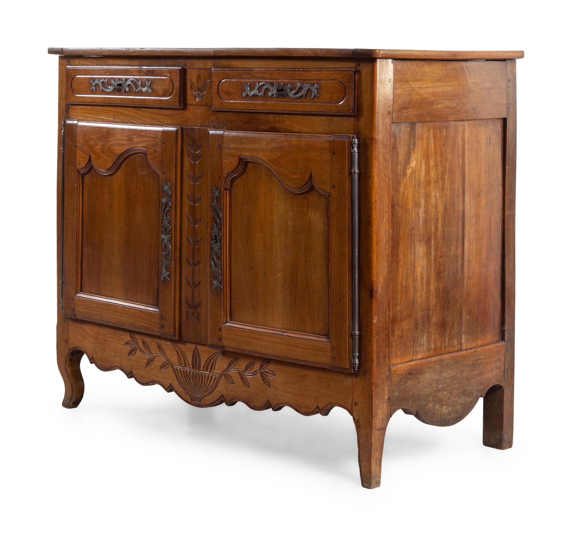 A Louis XV Provincial Walnut Cabinet