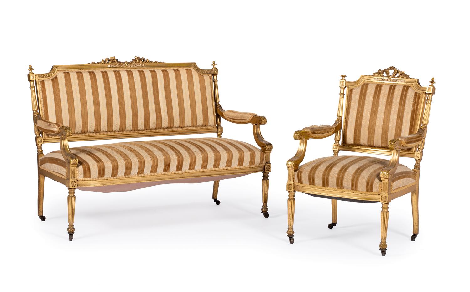 A Louis XVI Style Carved Giltwood Settee and Fauteuil