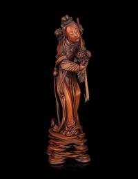 A Chinese Boxwood Figure of a Female Immortal