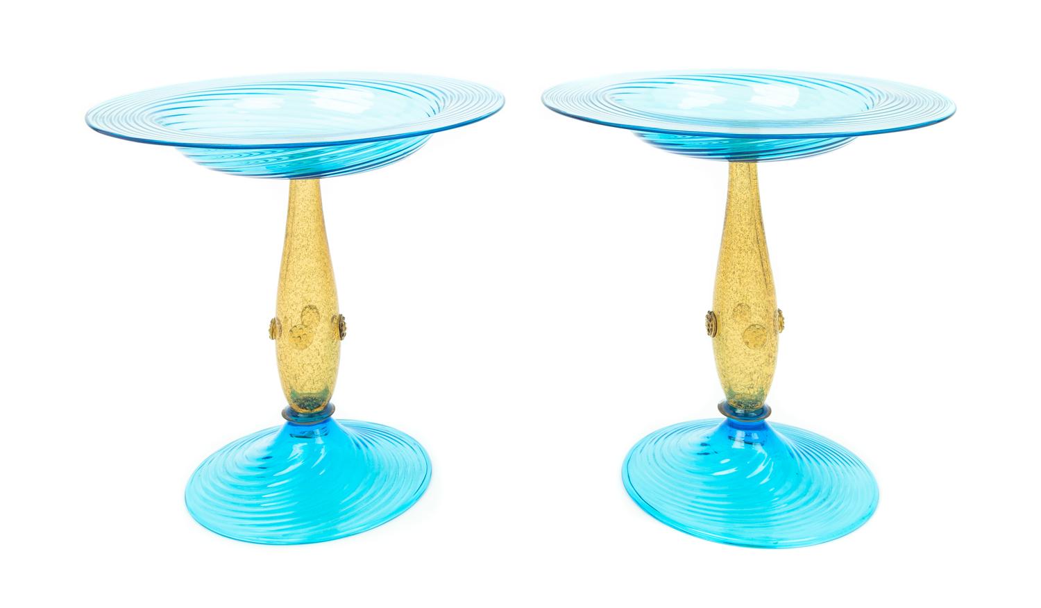 Steuben, 20TH CENTURY, two celeste blue glass compotes, form no. 6043, with mica flecked amber stems and applied prunts to stem