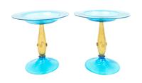 Steuben, 20TH CENTURY, two celeste blue glass compotes, form no. 6043, with mica flecked amber stems and applied prunts to stem