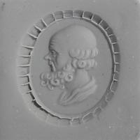 A Neoclassical Gold and Carnelian Finger Ring with a Portrait Head of Socrates