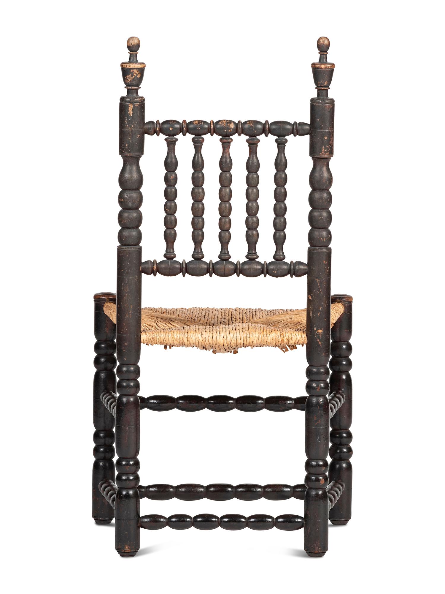 A Rare Pilgrim Century Black Painted Sausage-Turned Rush-Seat Side Chair