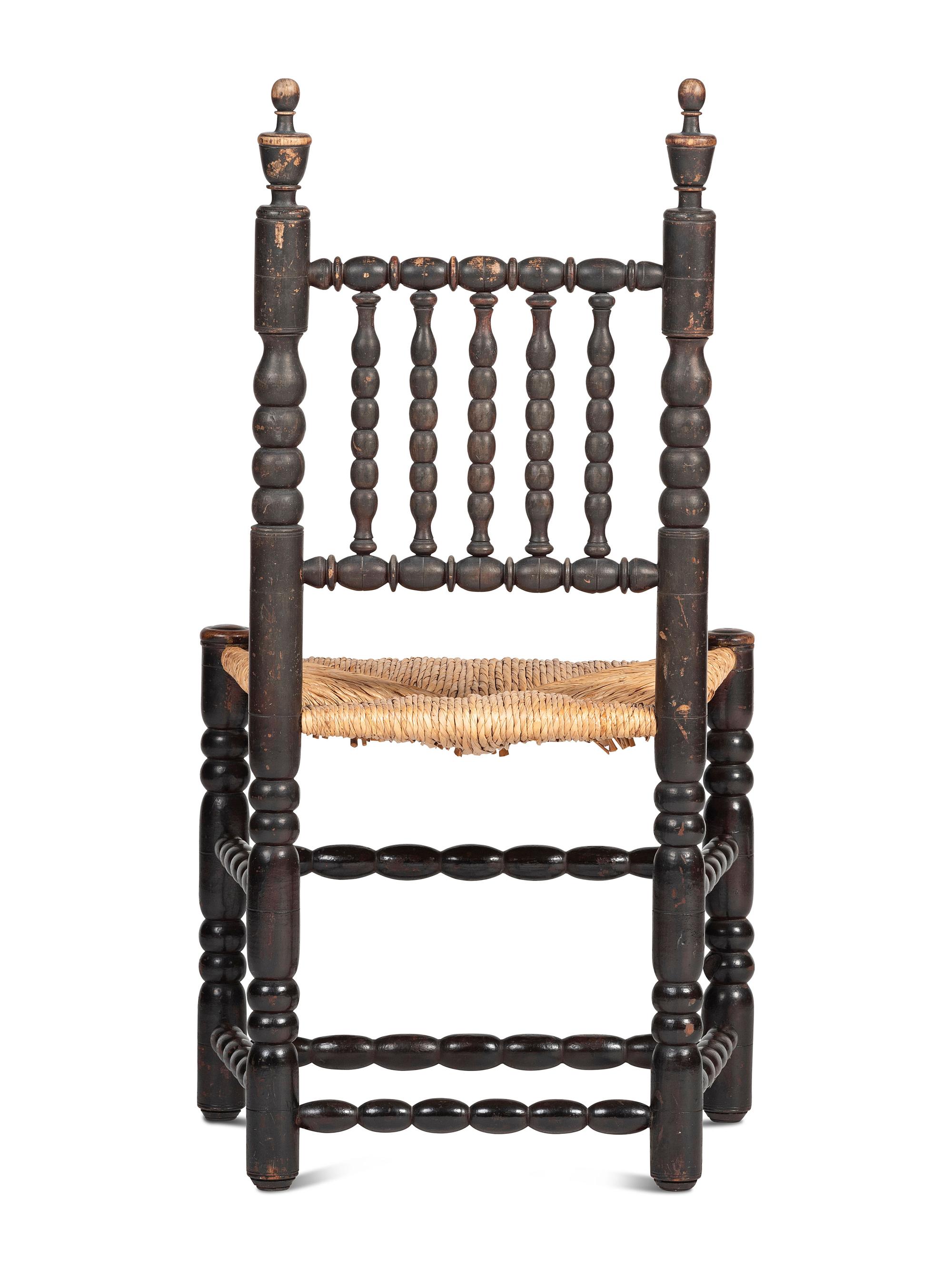 A Rare Pilgrim Century Black Painted Sausage-Turned Rush-Seat Side Chair