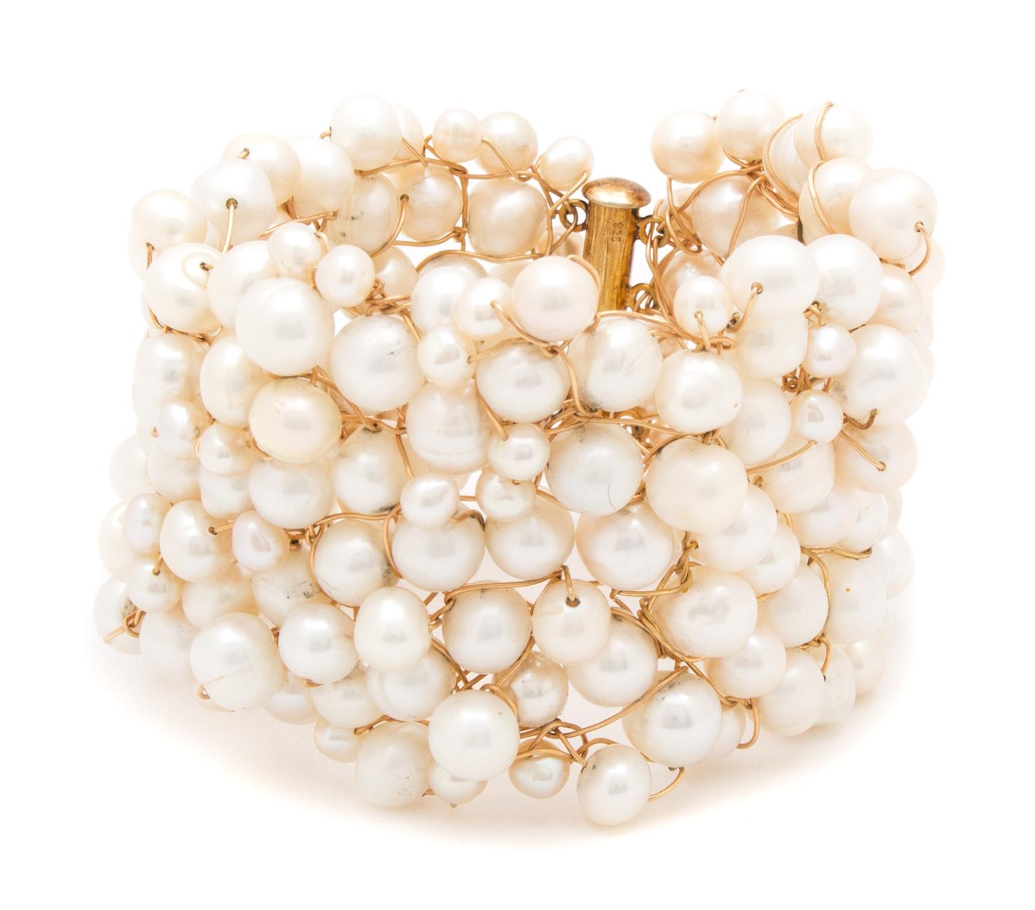 A Goldtone and Cultured Baroque Pearl Demi Parure, Necklace: 19" x 2"; Bracelet: 8" x 2".