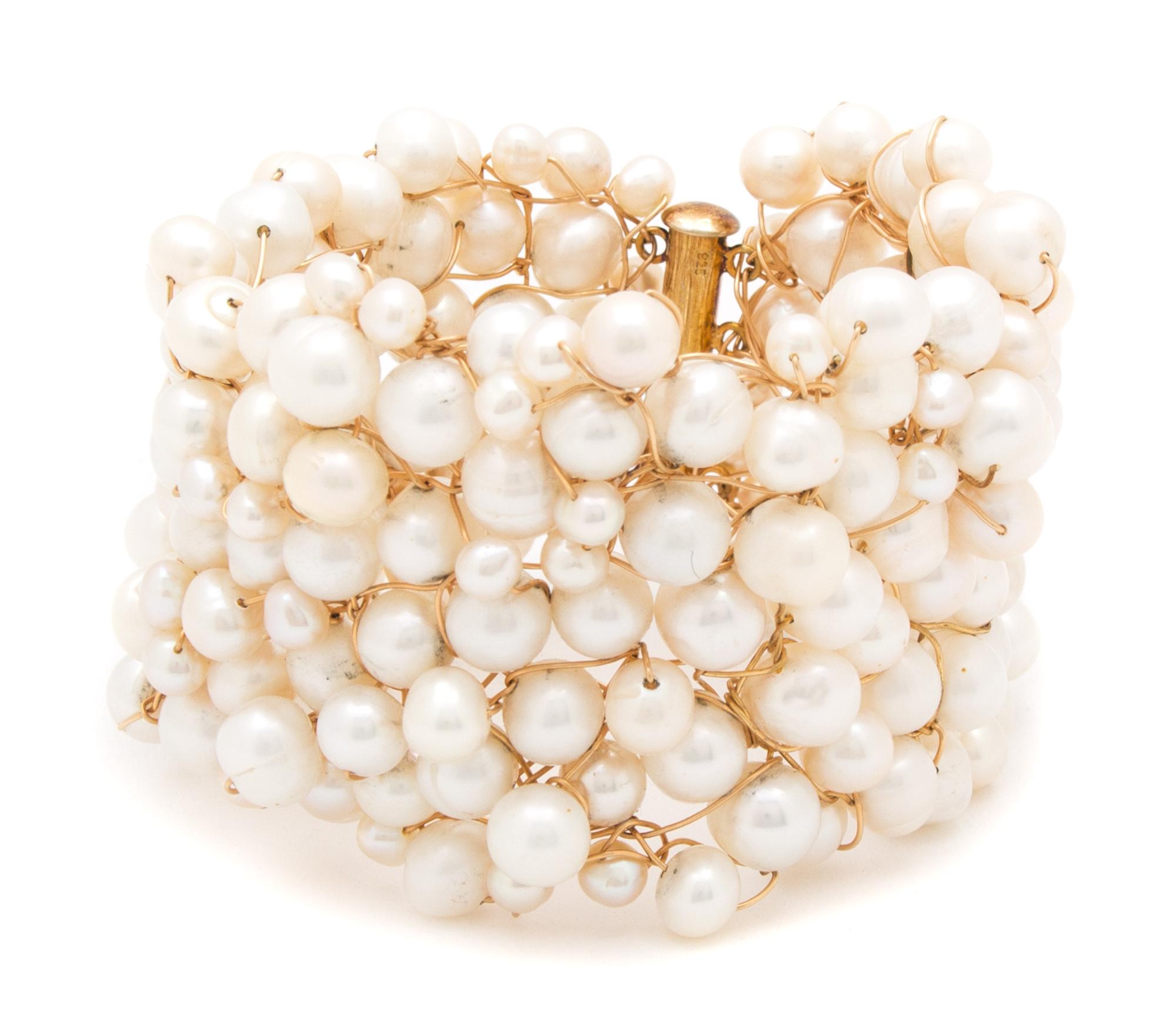 A Goldtone and Cultured Baroque Pearl Demi Parure, Necklace: 19" x 2"; Bracelet: 8" x 2".