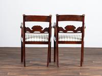 A Pair of Classical Cornucopia Carved Mahogany Armchairs