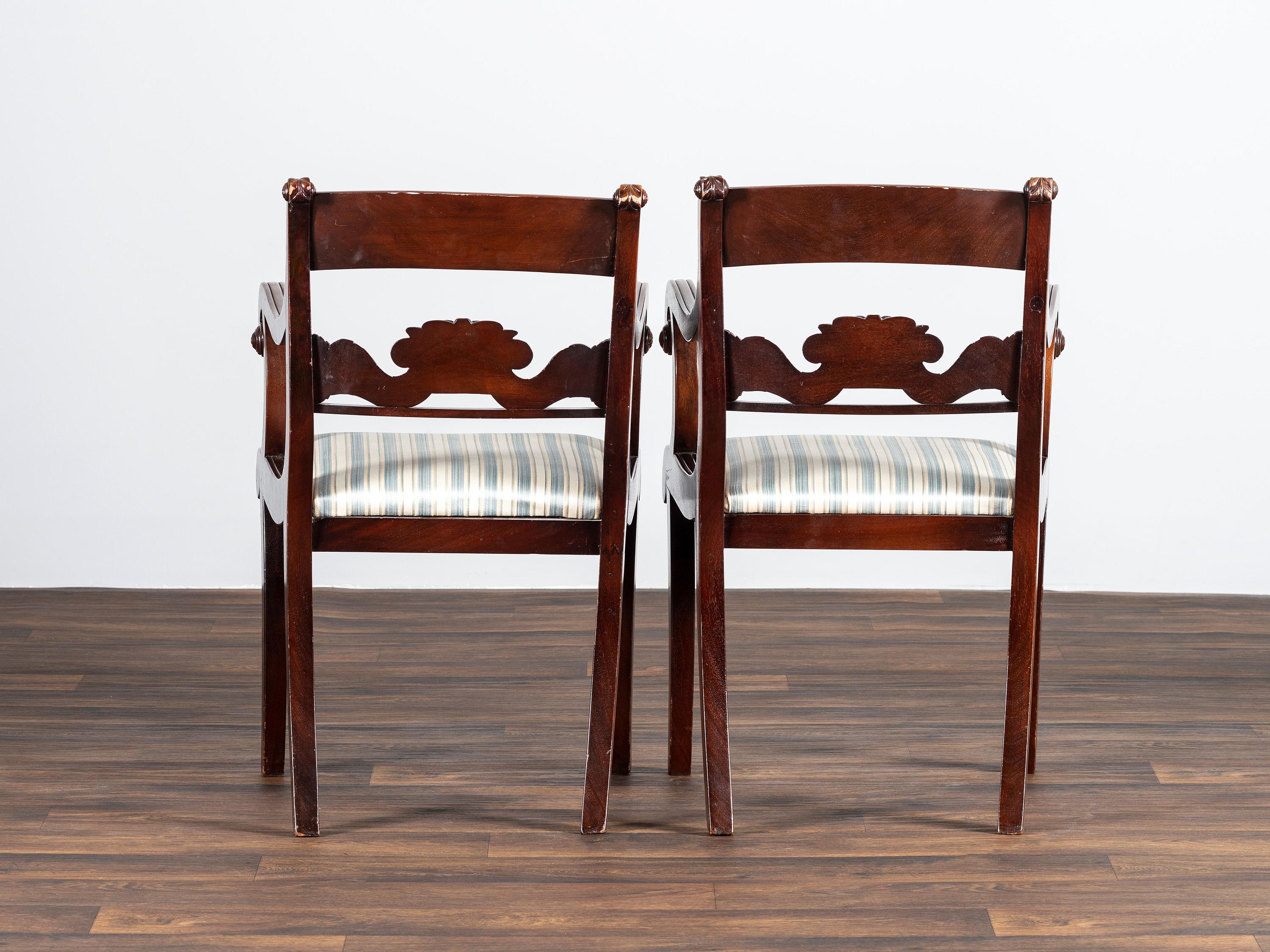 A Pair of Classical Cornucopia Carved Mahogany Armchairs