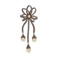 DIAMOND AND CULTURED PEARL BROOCH