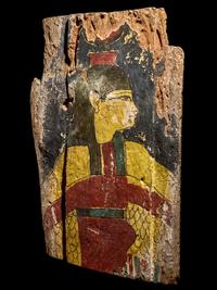 An Egyptian Painted Wood Sarcophagus Fragment with Isis